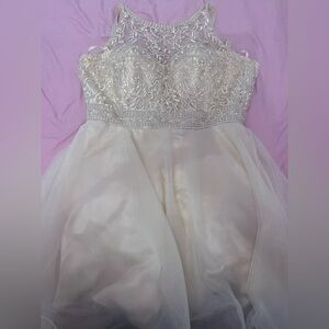 Champagne dama dress with a cross strap back and zipper